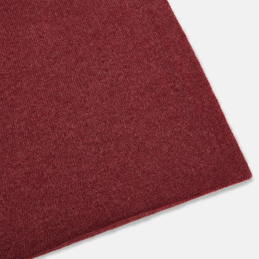 The Turnbull & Asser Plain Antique Pink Cashmere Knitted Scarf is neatly folded and knotted against a plain white background.