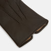 View 2 of product A pair of Turnbull & Asser Brown/Beige Fur-Lined Hairsheep Leather Touchscreen Gloves is shown on a white background, one displaying the back and the other the palm with a wrist button closure.