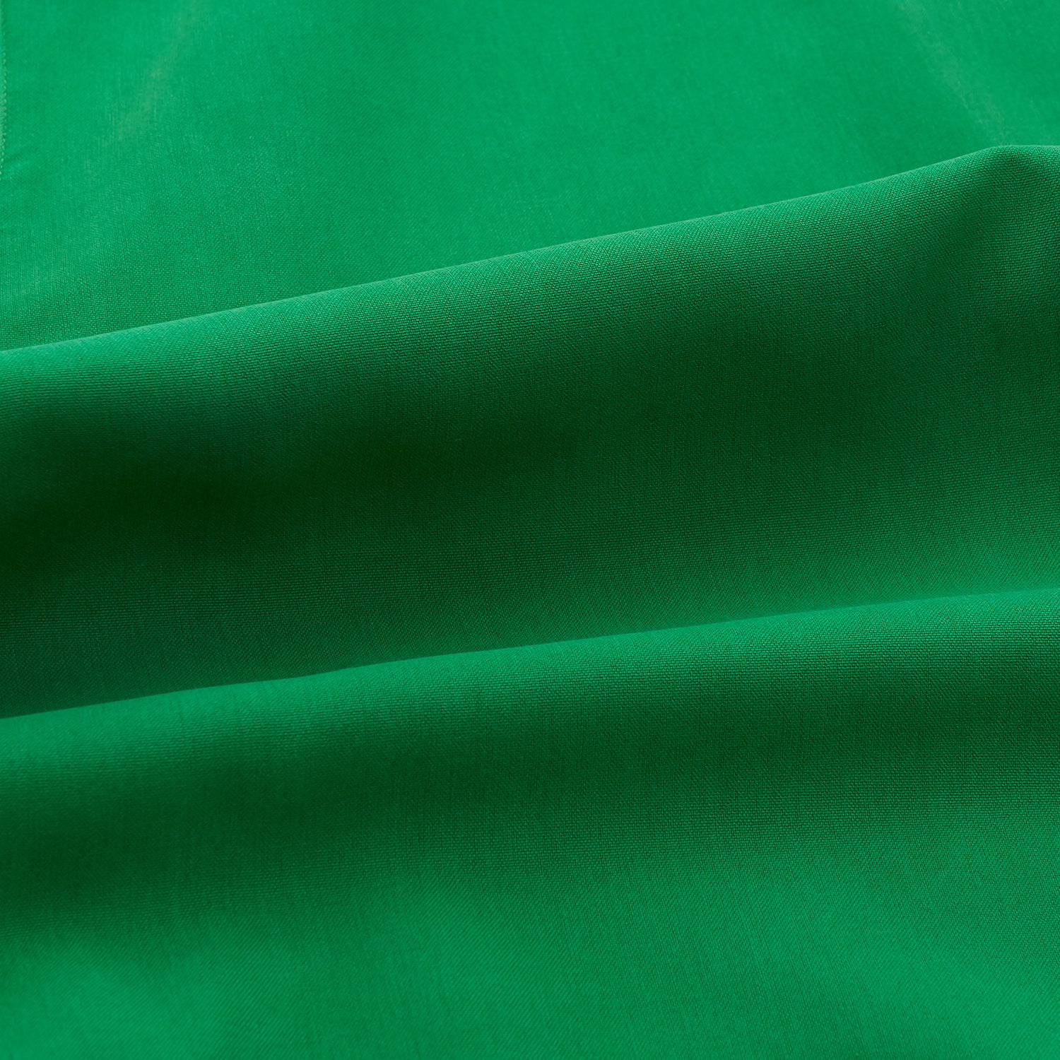View 2 of product The Turnbull & Asser Green Silk Hyde Pyjamas Set features a long-sleeve button-up top with three pockets and modern fit elastic waistband pants in silk blend, both shown laid flat on a white background.