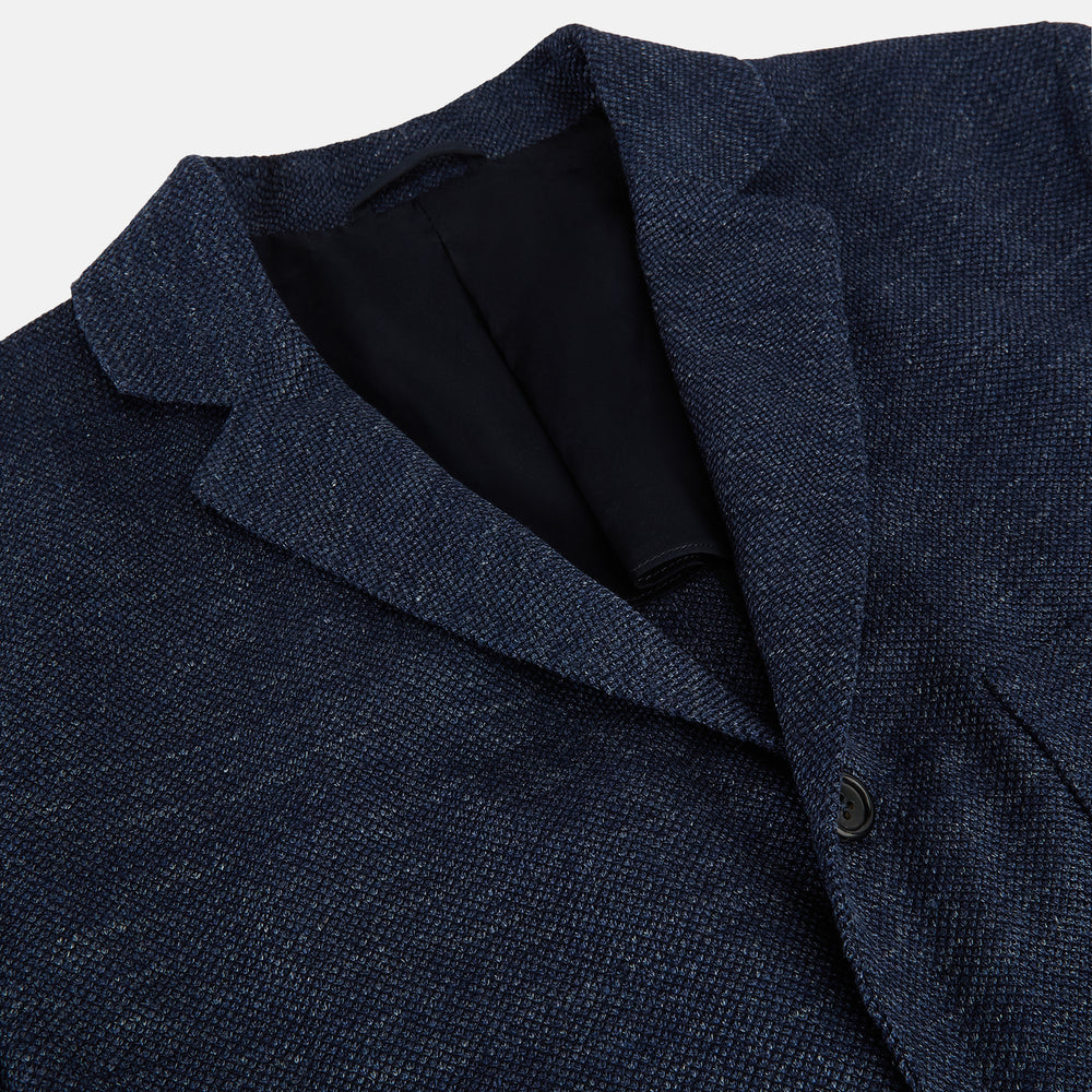 The Turnbull & Asser Navy Linen Blend Cambridge blazer features British tailoring with a notched lapel, two buttons, and three front pockets, shown on a plain white background.