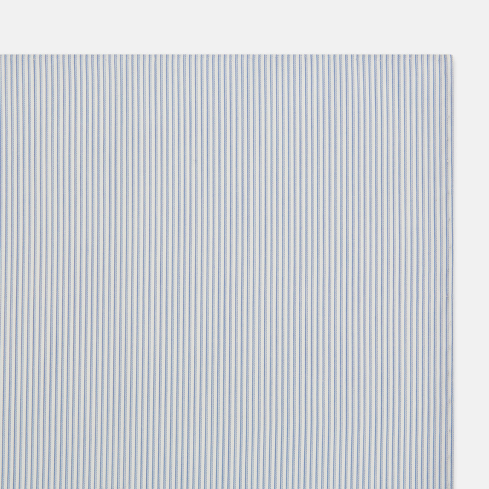 The Turnbull & Asser Sky Blue Hairline Stripe Hand-Rolled Handkerchief, featuring thin blue and white stripes and hand-rolled edges, is displayed flat on a white background.