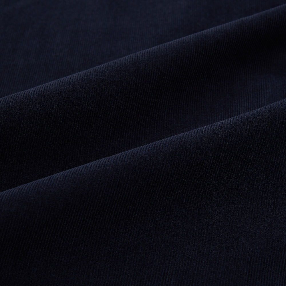 A navy corduroy Windsor shirt by Turnbull & Asser, featuring British craftsmanship and a classic collar, displayed on a plain white background.