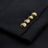 View 4 of product The Classic Navy Wool Blazer by Turnbull & Asser features a double-breasted design, gold buttons, notched lapels, and multiple front pockets, shown on a white background. This piece offers timeless, sophisticated nautical style.