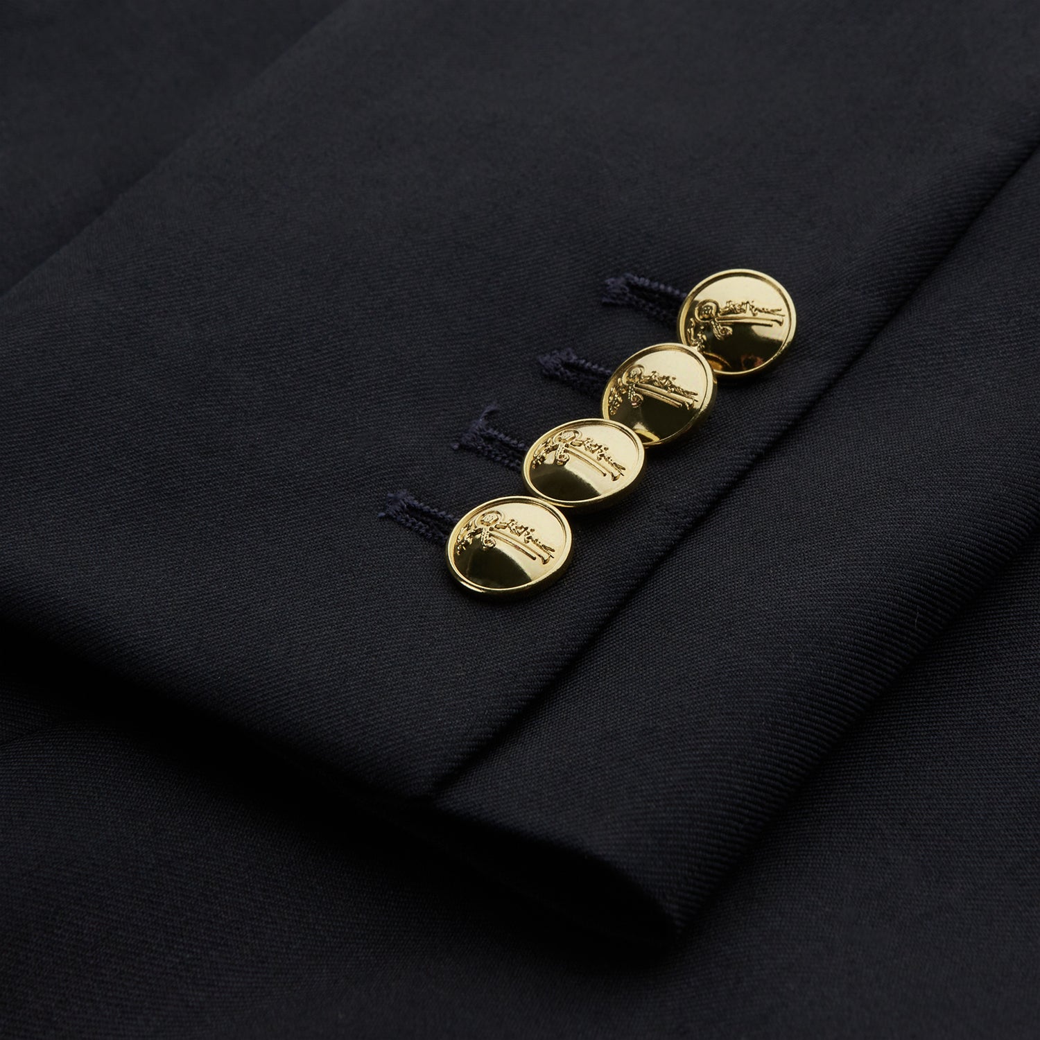 View 4 of product The Classic Navy Wool Blazer by Turnbull & Asser features a double-breasted design, gold buttons, notched lapels, and multiple front pockets, shown on a white background. This piece offers timeless, sophisticated nautical style.