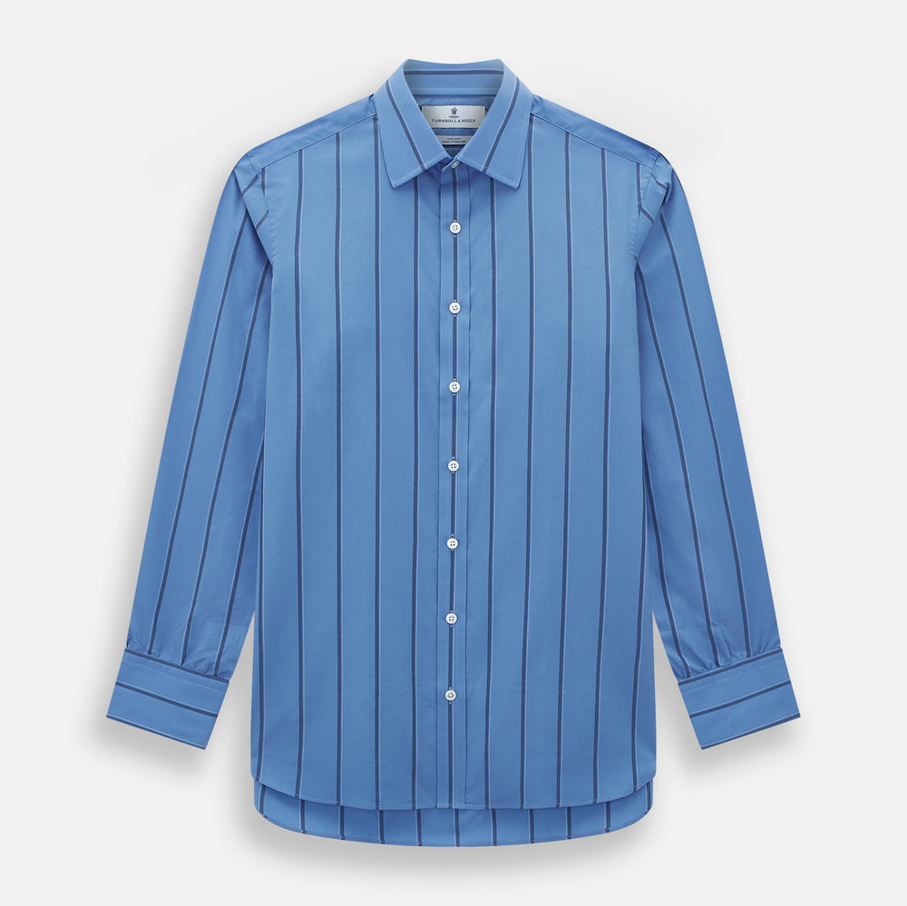 The Turnbull & Asser Colony Blue Track Stripe Mayfair Shirt is crafted from Italian cotton with long sleeves, dark blue track stripes, a classic collar, and buttoned cuffs, shown against a white background.