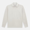 View 1 of product A pale pink luxury cotton rugby polo shirt by Turnbull & Asser, featuring long sleeves and a collar with no buttons, displayed flat on a white background.