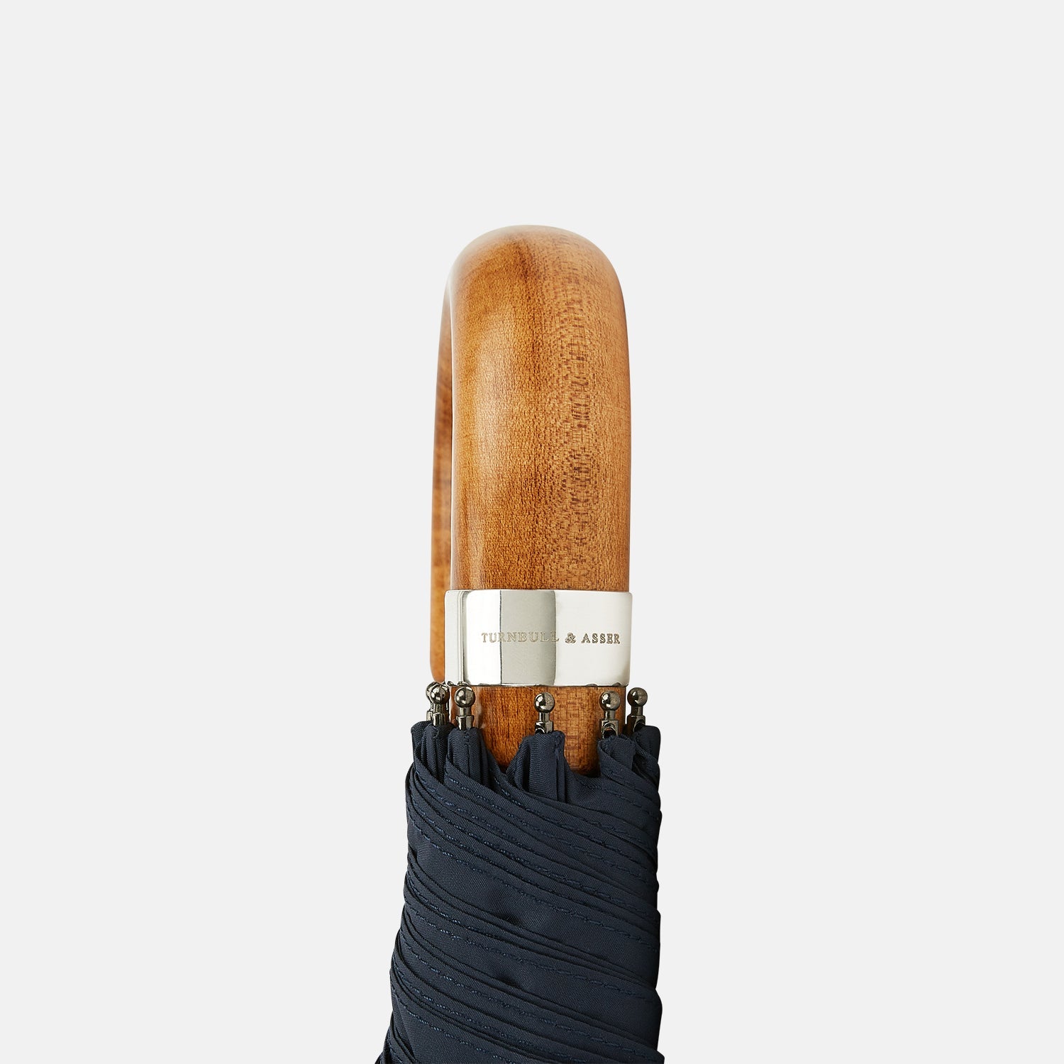 View 3 of product The Turnbull & Asser Navy Telescopic Umbrella features a brown maple crook handle and is shown fully open against a plain white background.