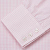 View 4 of product The Pink Windowpane Check Mayfair Shirt by Turnbull & Asser is crafted in light pink organic cotton with a subtle windowpane check, button-down front, and pointed collar, displayed flat on a white background.