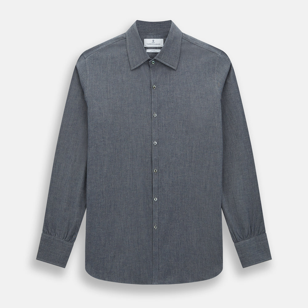 The Turnbull & Asser Azzurro Westminster Shirt in dark grey features long sleeves, a classic collar, buttoned cuffs, and a straight hem, showcased against a white background, highlighting refined British craftsmanship.