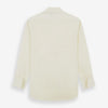 View 5 of product The Turnbull & Asser Tomorrow Never Dies Cream Cotton Hamburg Shirt, as seen on James Bond, features a long sleeve, button-down front, and collar. It's laid flat on a white background.