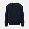 View 3 of product The Navy Melange Cashmere Cardigan by Turnbull & Asser features long sleeves, a V-neck, five dark buttons, ribbed cuffs and hem, and two front pockets. Shown against a plain white background.