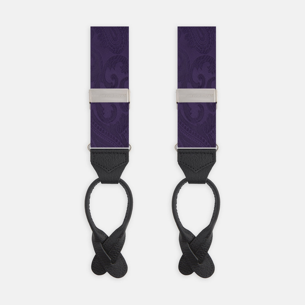 Turnbull & Asser's Purple Paisley Adjustable Silk Braces feature black leather loops and silver adjusters, offering refined sartorial style. Shown against a white background.