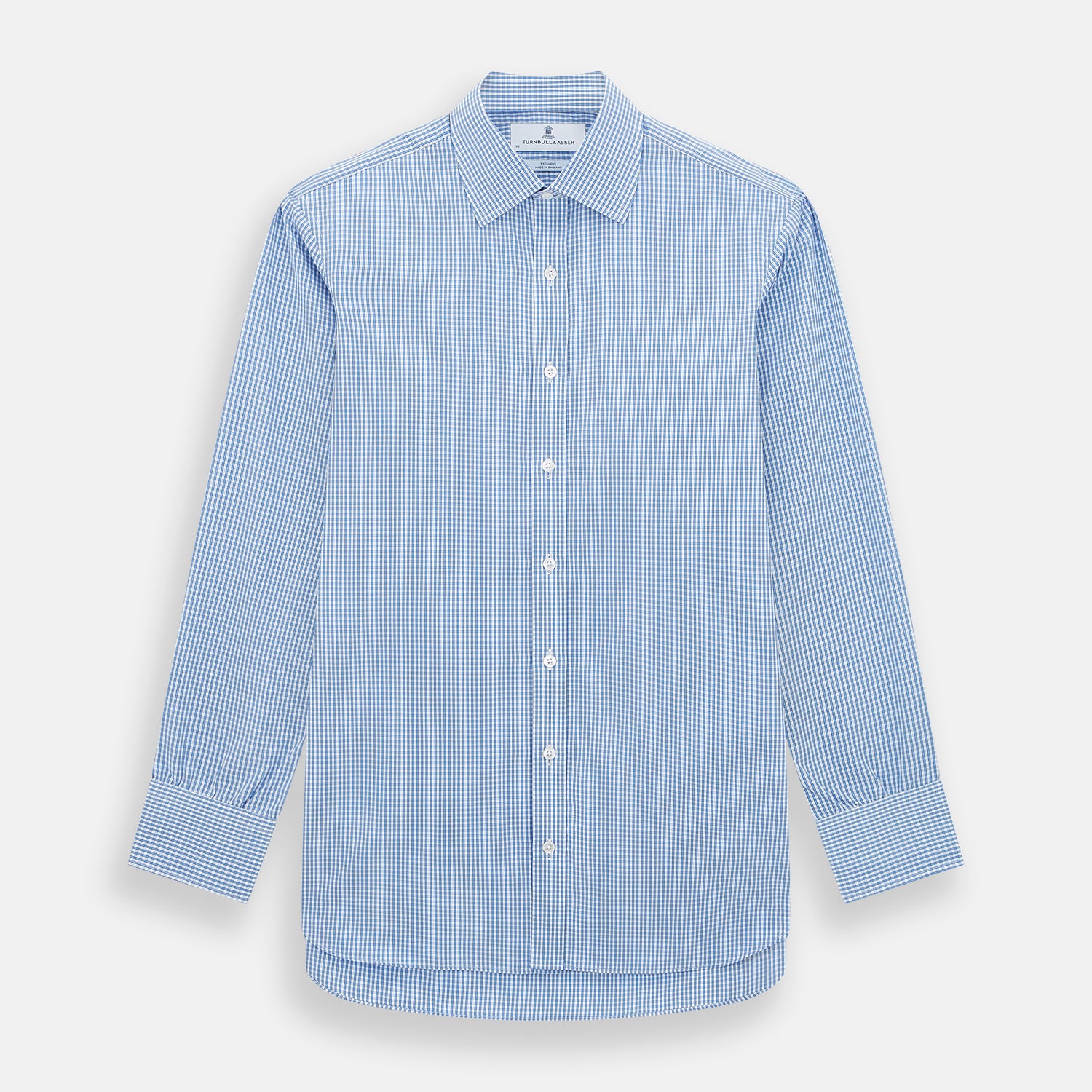 View 1 of product The Turnbull & Asser Blue Multi Micro Check Mayfair Shirt features a classic T&A collar, button-up front, white buttons, cuffed long sleeves, and a refined light blue and white micro check pattern.