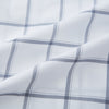 View 6 of product The Turnbull & Asser Grey Grid Check Mayfair Shirt features a classic collar and buttoned cuffs, crafted from fine Italian cotton with a grey grid check on white, and is shown against a plain white background.