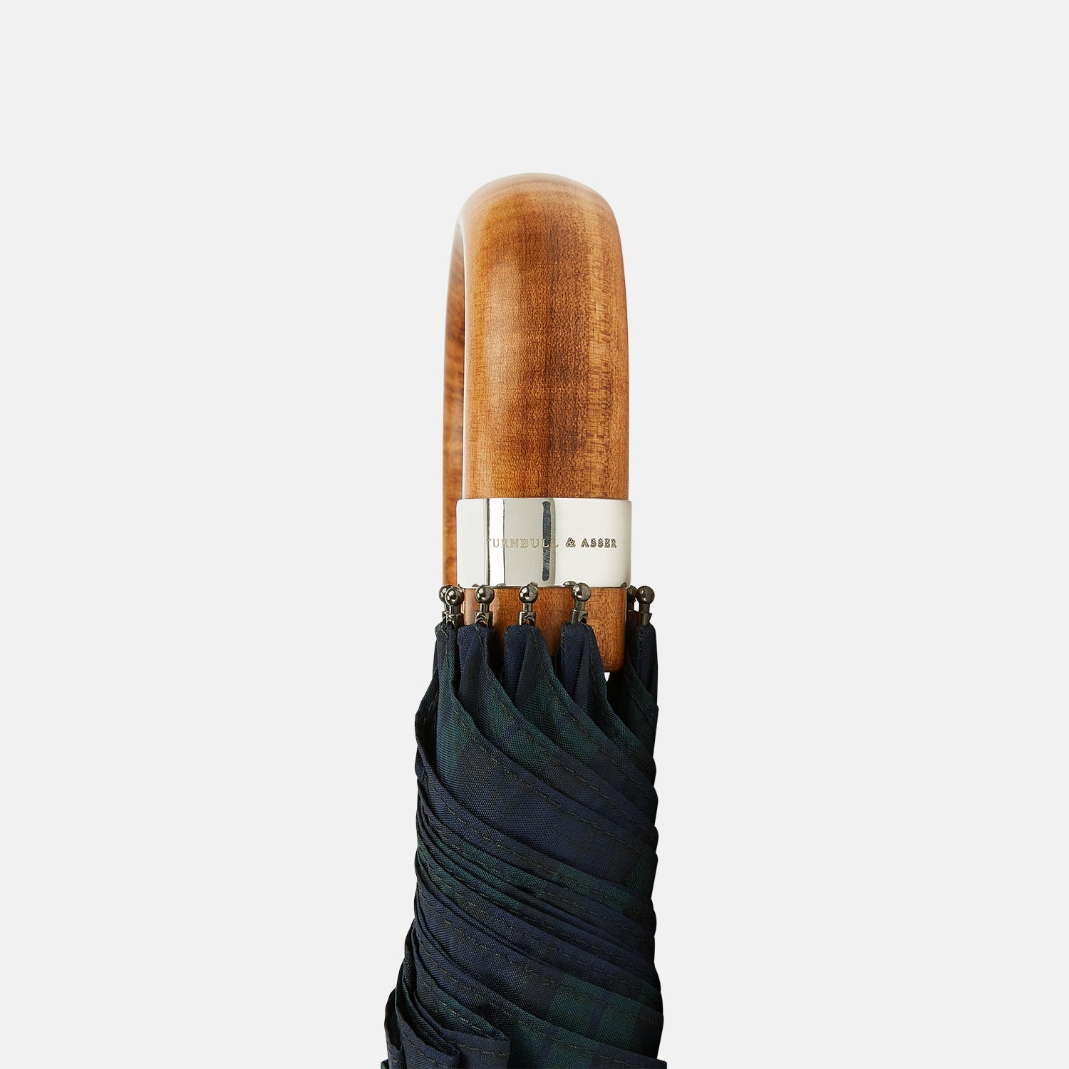 View 3 of product The Turnbull & Asser Black Watch Tartan Telescopic Umbrella features a green and blue plaid pattern and a whangee crook handle, offering classic luxury against a plain white background.