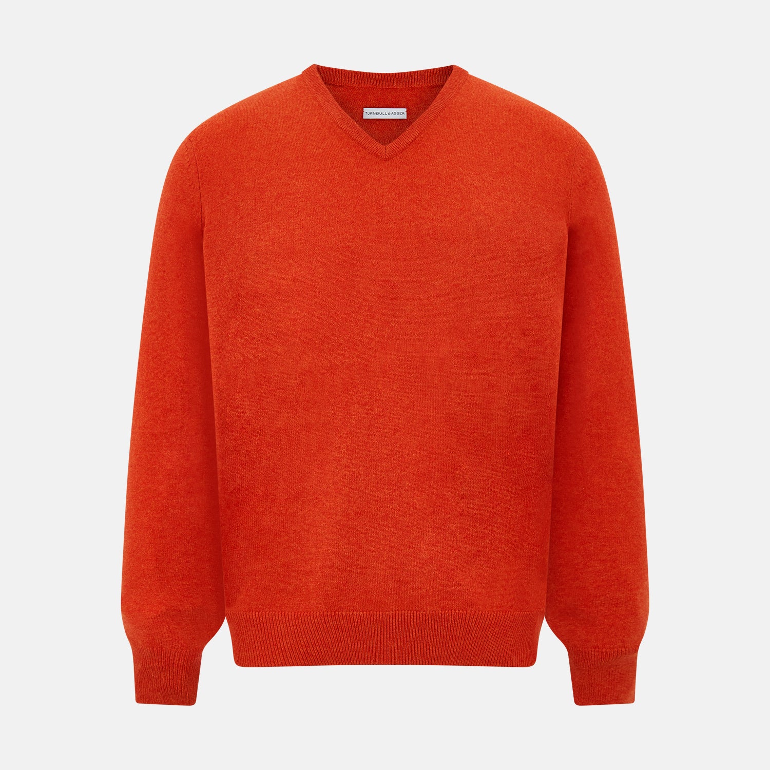 View 1 of product The Turnbull & Asser Red Orange Cashmere V-neck Jumper features long sleeves, ribbed cuffs and hem, displayed on a plain white background—a stylish knitwear essential for any wardrobe.