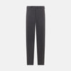 View 1 of product Turnbull & Asser’s Dark Chocolate Striped Edmund trousers feature straight-cut legs, a relaxed fit, button closure, and belt loops. These cotton trousers display subtle vertical stripes against a plain white background.