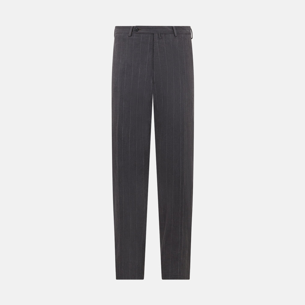 Turnbull & Asser’s Dark Chocolate Striped Edmund trousers feature straight-cut legs, a relaxed fit, button closure, and belt loops. These cotton trousers display subtle vertical stripes against a plain white background.