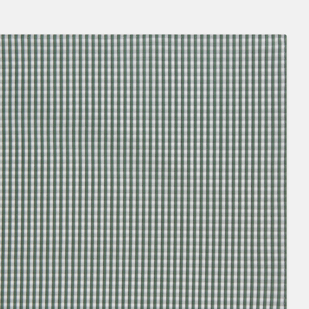 The Turnbull & Asser Melon Green Micro Shadow Check Hand-Rolled Handkerchief is displayed flat against a white background, showcasing its green and white check pattern and expertly hand-rolled edges.