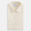 View 5 of product The Cream Fine Pencil Stripe Mayfair Shirt by Turnbull & Asser features long sleeves, a pointed collar, and buttoned cuffs. Crafted from breathable cotton with fine pencil stripes, it is shown laid flat on a white background.