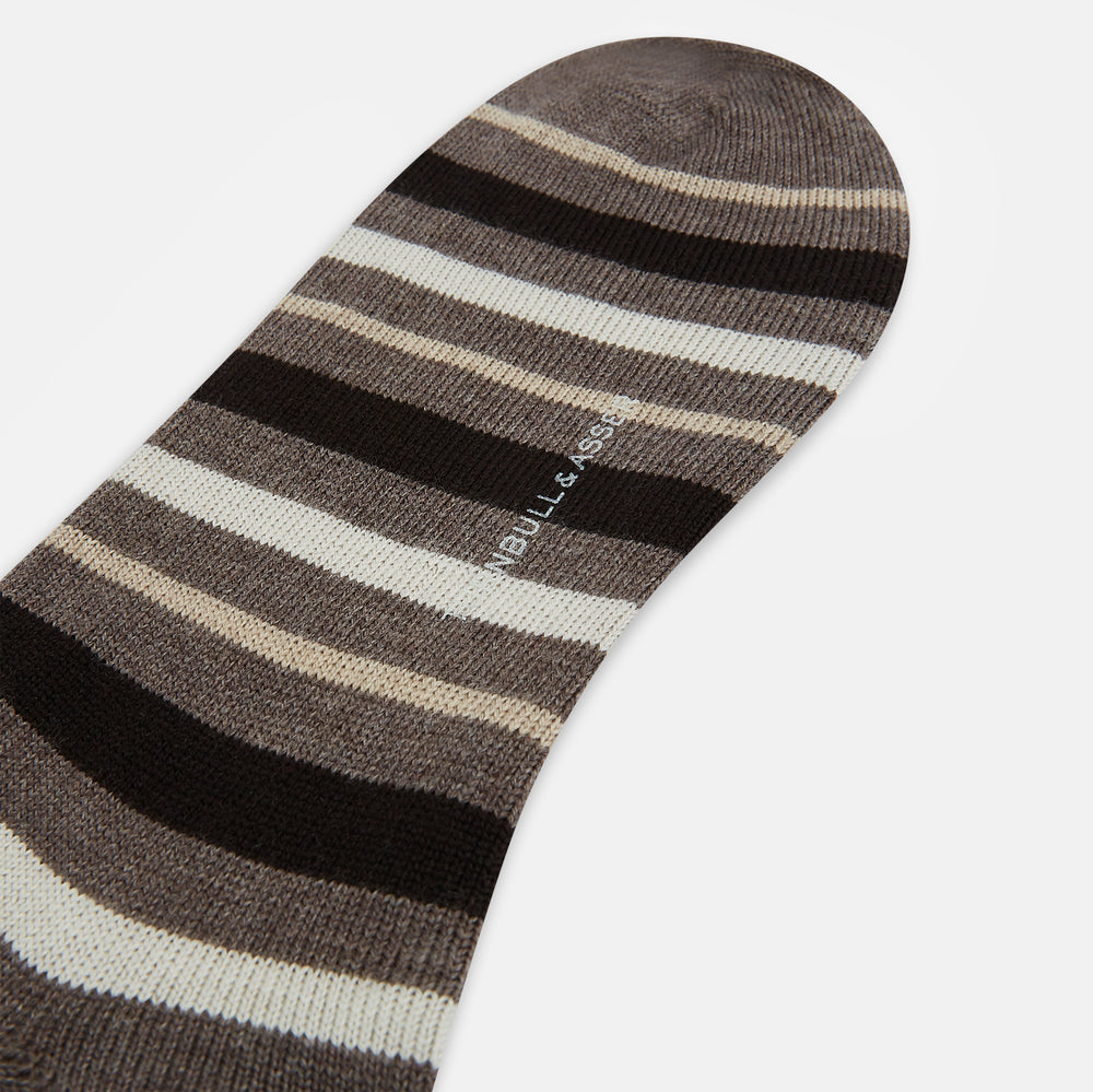 The Coffee Striped Merino Wool Long Socks by Turnbull & Asser feature knee-high length with horizontal brown, beige, and cream stripes, shown against a plain white background.