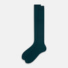 View 2 of product A single Forest Green Long Sock by Turnbull & Asser, featuring a ribbed texture and over the calf length, is displayed upright on a plain light gray background.