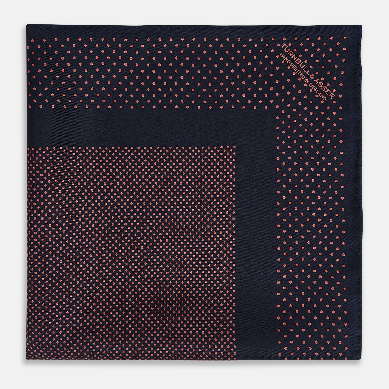 View 3 of product The Turnbull & Asser Navy and Orange Dot Silk Pocket Square features exquisite handmade craftsmanship.