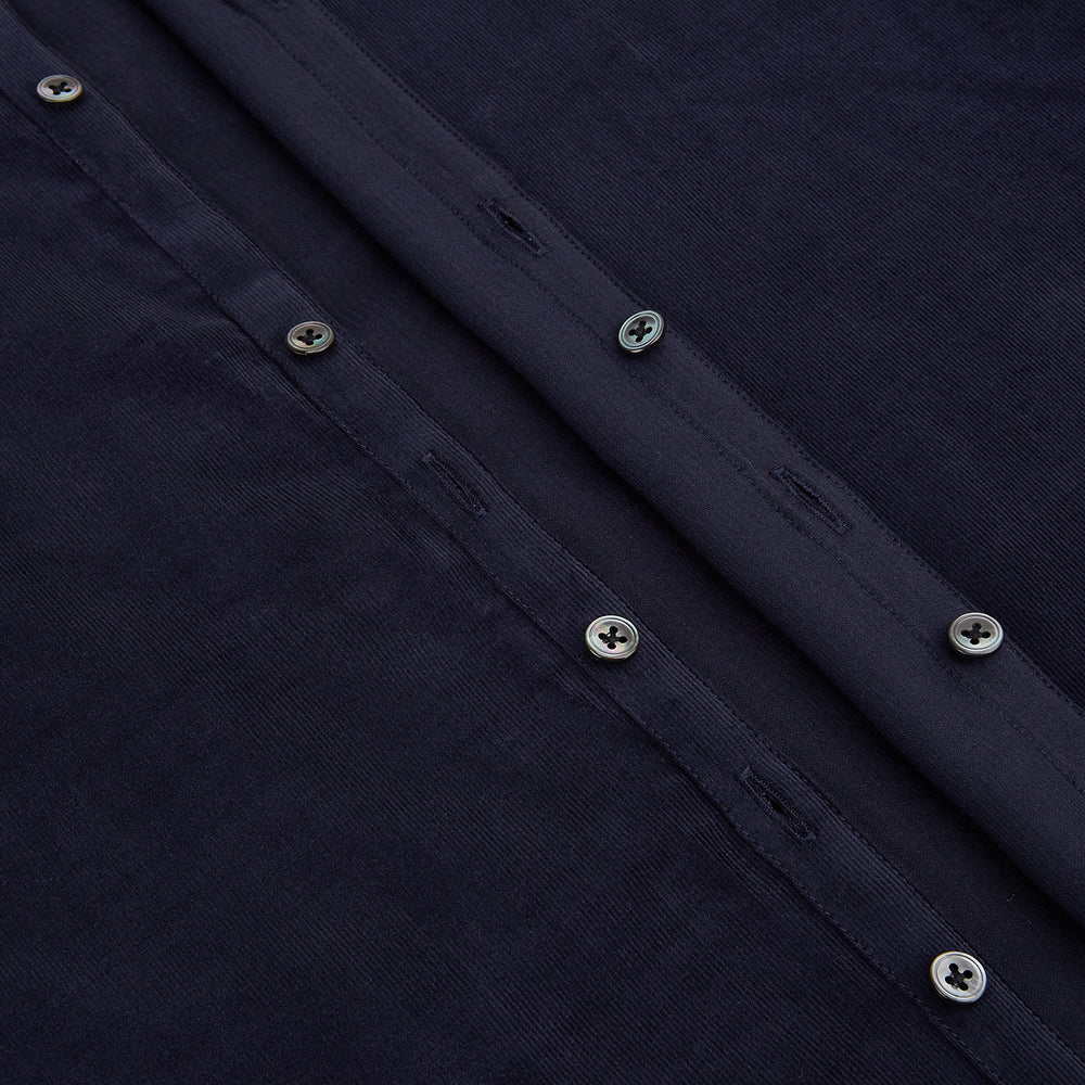 A navy corduroy Windsor shirt by Turnbull & Asser, featuring British craftsmanship and a classic collar, displayed on a plain white background.