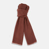 View 1 of product A Burgundy and White Striped Cashmere Scarf by Turnbull & Asser is neatly folded on a plain, light gray background.