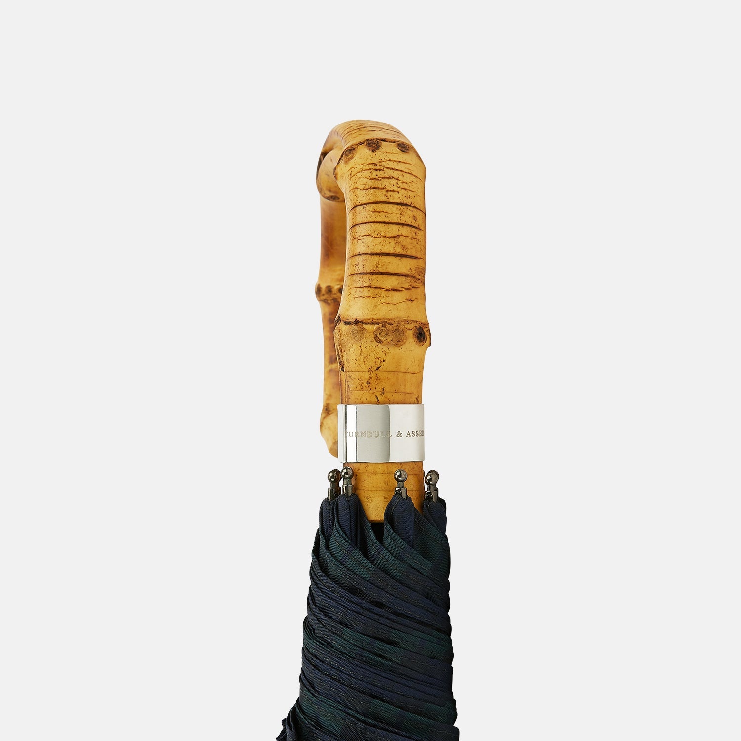 View 3 of product The Turnbull & Asser Black Watch Tartan Telescopic Umbrella features a classic dark green and blue plaid design with a whangee crook handle, highlighting the brand’s renowned craftsmanship against a plain white background.