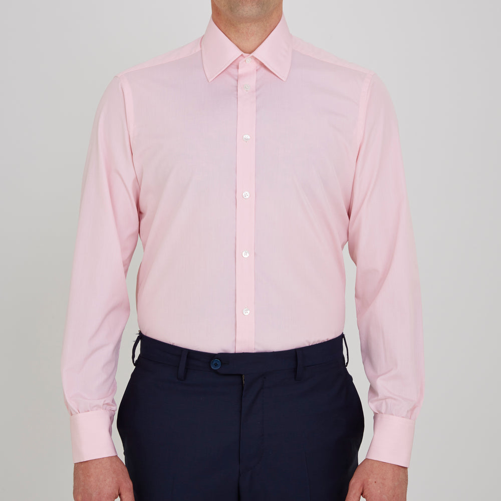 The Pink End-on-End Shirt with T&A Collar and Double Cuffs by Turnbull & Asser, shown neatly folded on a white background, updates timeless elegance with its classic detailing and refined pink hue.