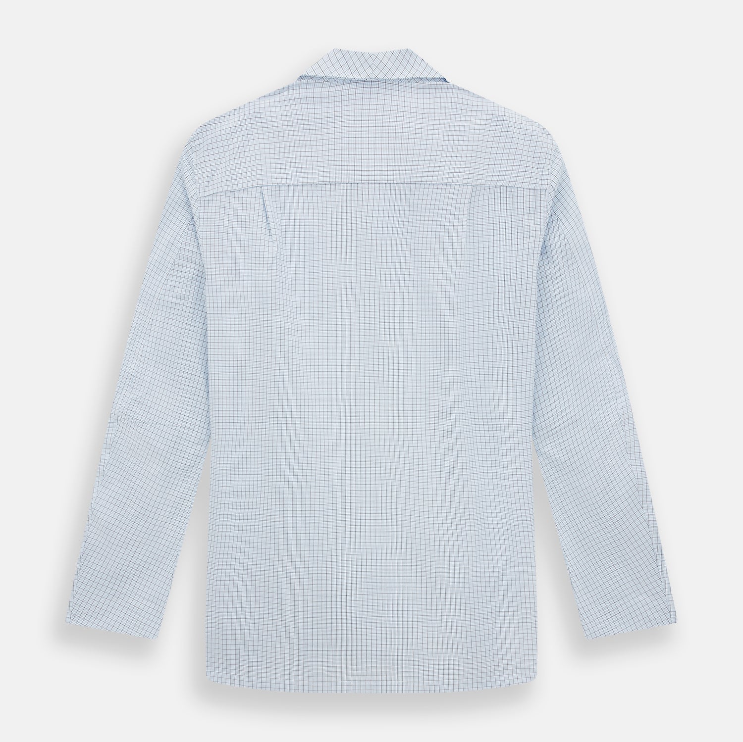 View 3 of product The Turnbull & Asser Blue Graph Check Pyjama Shirt features long sleeves, a collar, and a small check pattern in light blue—ideal as elegant loungewear.