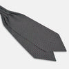 View 3 of product The Forest Green and Red Weave Patterned Silk Cravat by Turnbull & Asser features an elegant geometric design in rich hues, folded to a pointed end for a classic, British-inspired look.