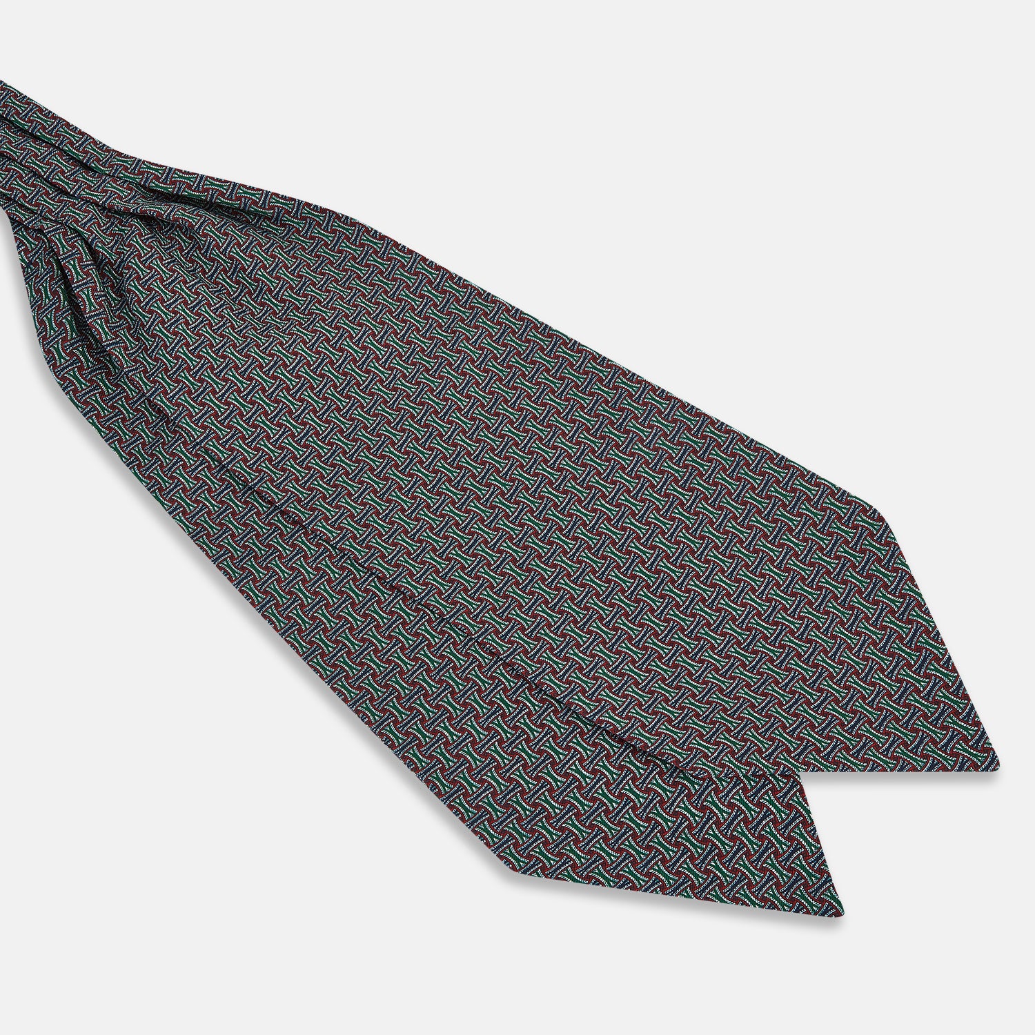 View 3 of product The Forest Green and Red Weave Patterned Silk Cravat by Turnbull & Asser features an elegant geometric design in rich hues, folded to a pointed end for a classic, British-inspired look.