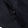 View 5 of product The Turnbull & Asser Navy Single-breasted Waistcoat is a sleeveless wool-cashmere piece with a small chest pocket and two side pockets, shown against a white background—an ideal addition to your winter wardrobe.