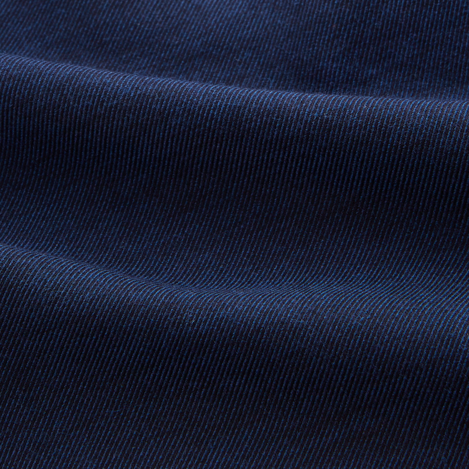 View 5 of product The Turnbull & Asser Navy Weekend Fit Nevis Cotton-Cashmere Shirt features a Dorset collar, button front, 1-button cuffs, and two button-flap chest pockets, shown laid flat on a white background.