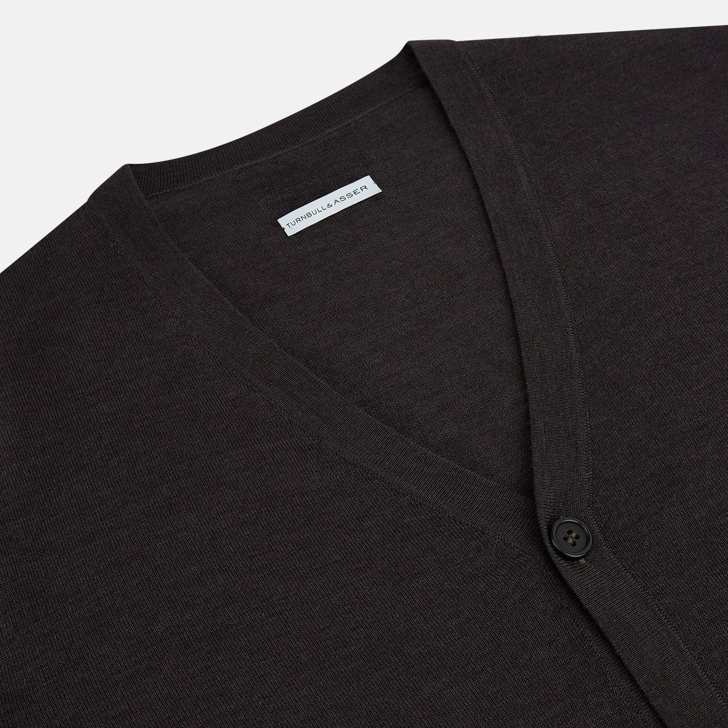 View 2 of product The Turnbull & Asser Brown Fine Merino V-Neck Cardigan is a classic, long-sleeved button-up knitwear piece, shown on a white background—a wardrobe essential.