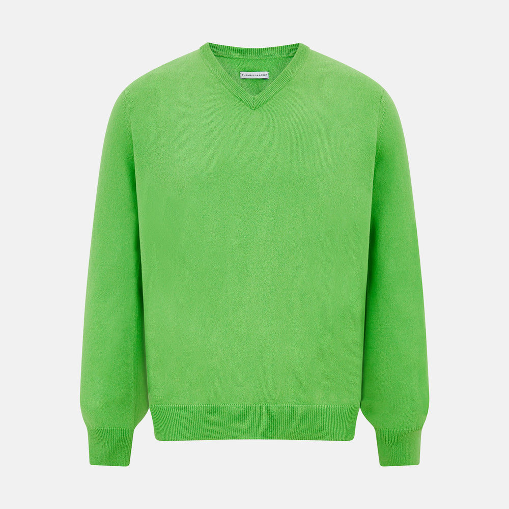 The Turnbull & Asser Lime Green Cashmere V-Neck Jumper features long sleeves and ribbed cuffs, hem, and neckline—ideal for adding vibrant color to your knitwear collection. Displayed on a white background.