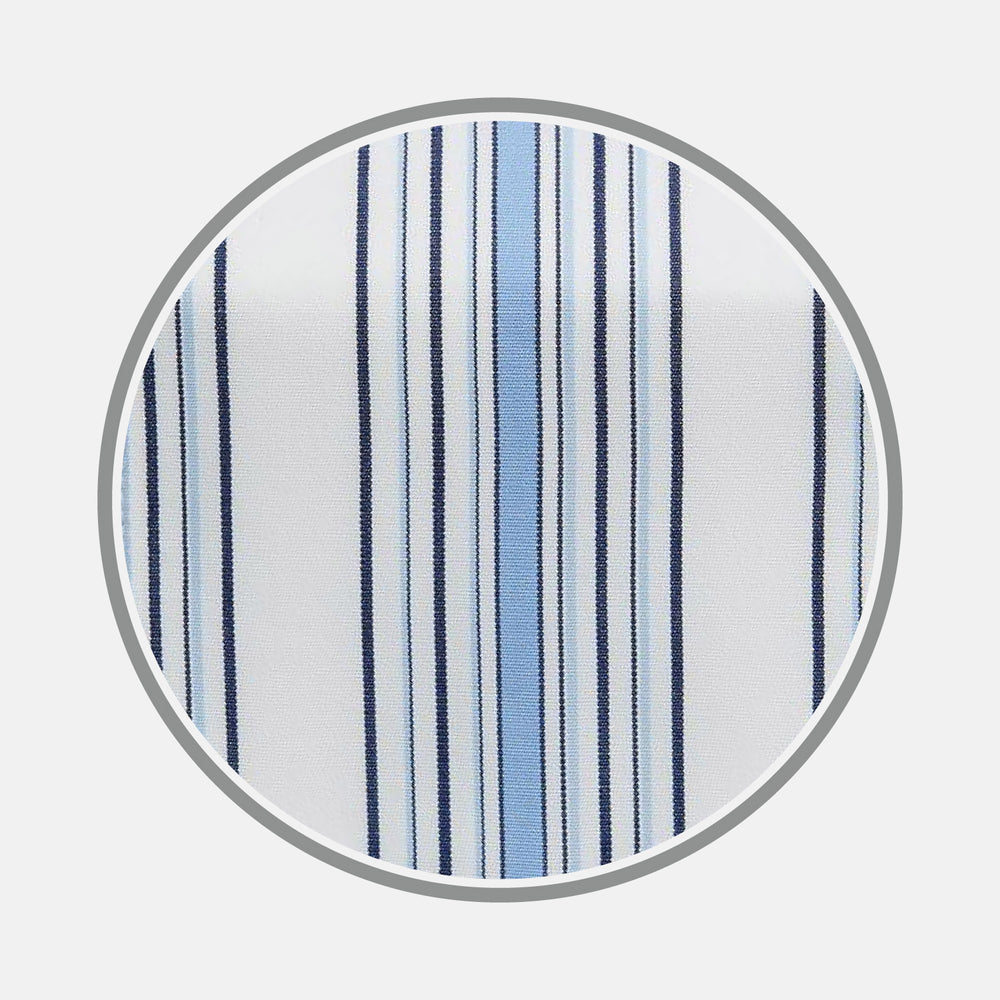 A close-up of Turnbull & Asser's Blue Multi Stripe Cotton Fabric shows white material with vertical light and dark blue stripes in varying widths, displayed inside a circular frame.