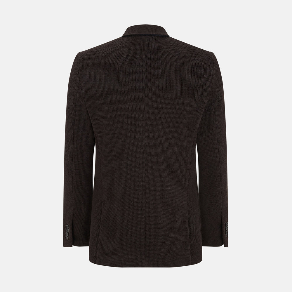 The Turnbull & Asser Dark Chocolate Knitted Cambridge Blazer for men, made from fine Italian wool with British tailoring, features a notched lapel, three front buttons, and three patch pockets, shown on a plain white background.