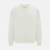 View 6 of product The Turnbull & Asser White Fine Merino V-Neck Jumper, shown against a white background, features a timeless design with long sleeves and ribbed cuffs and hem.