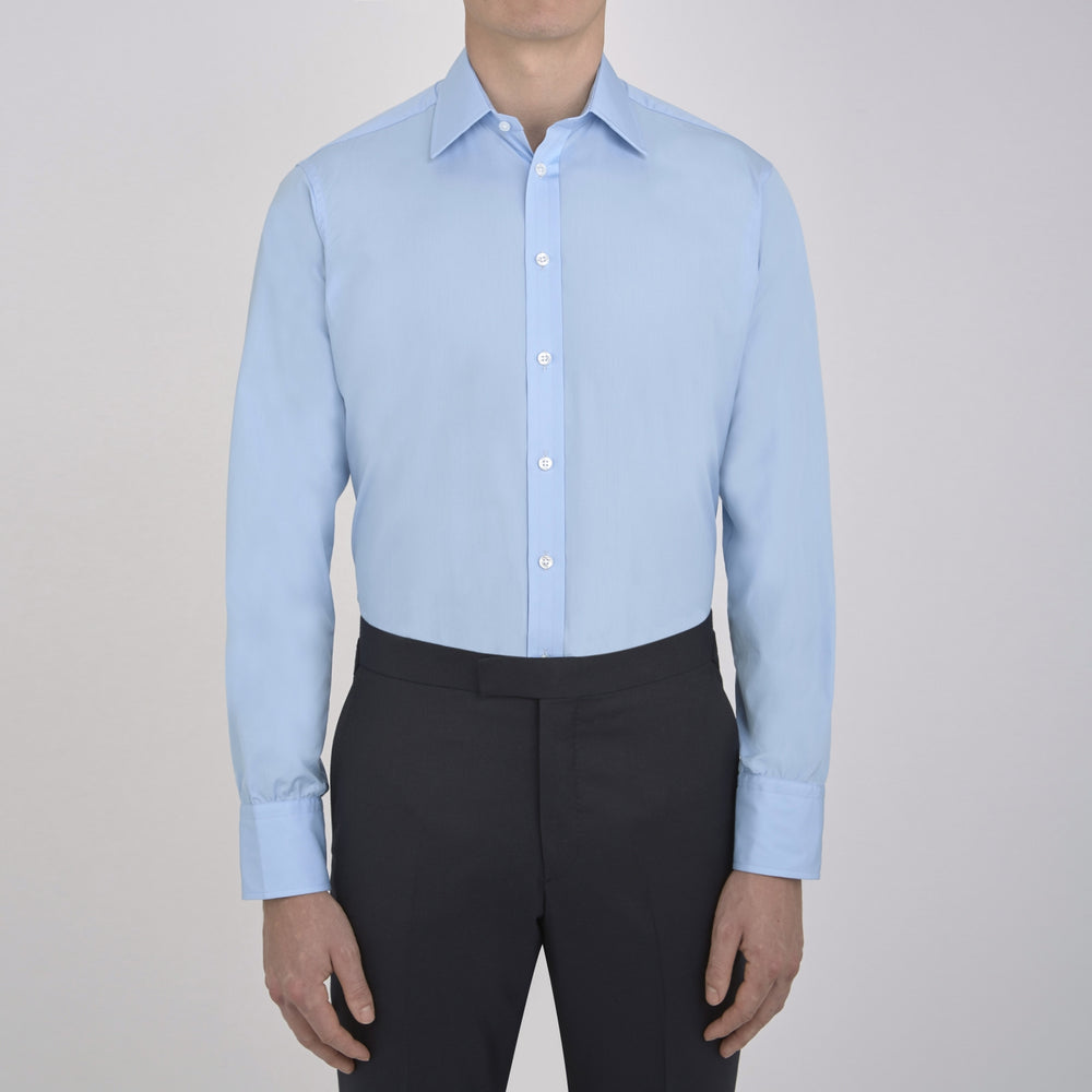 A Light Blue Cotton Shirt with a T&A collar and 3-button cuffs by Turnbull & Asser is displayed on a plain white background, ideal for pairing with a navy suit.