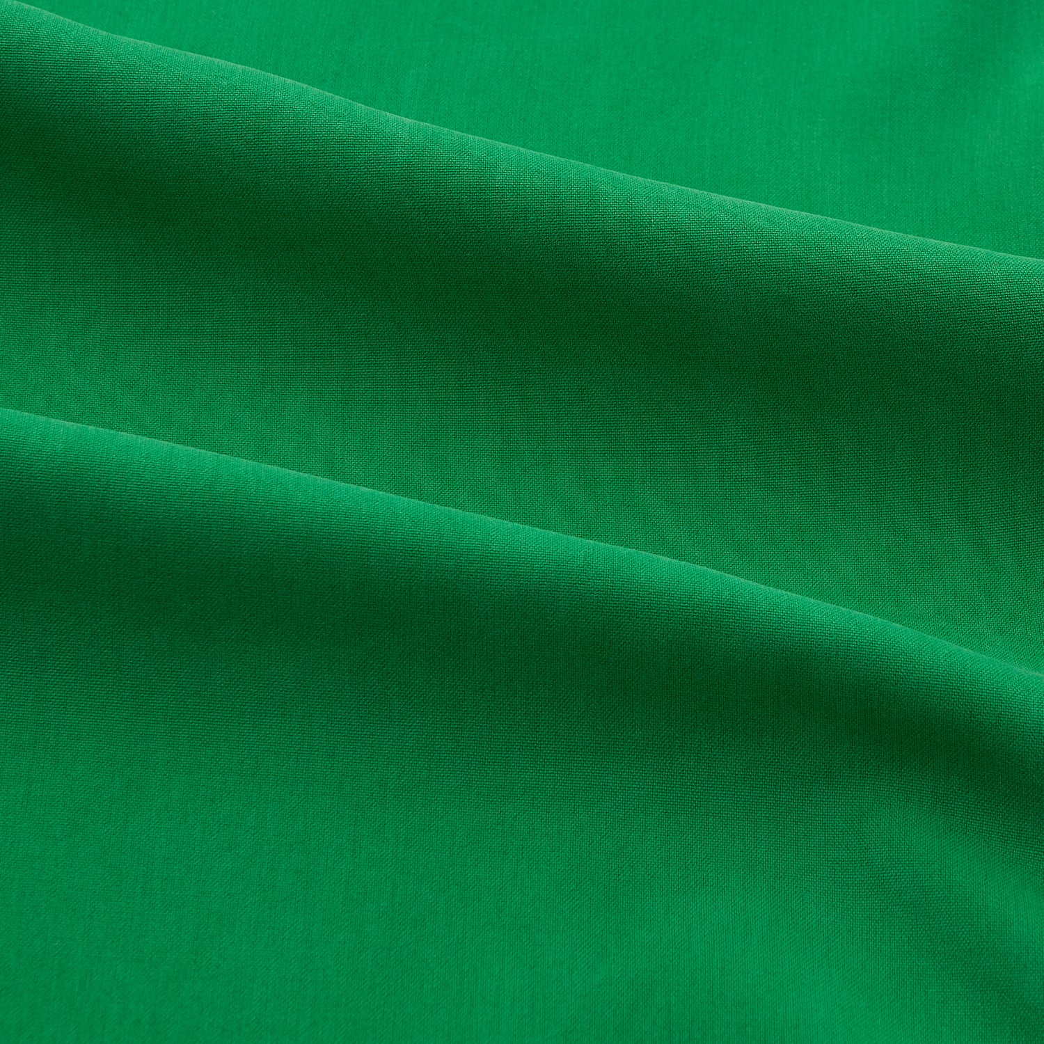 View 4 of product The Green Sandwashed Silk Regular Fit Mayfair Shirt by Turnbull & Asser, featuring long sleeves, a T&A collar, and white buttons, is displayed flat on a white background.
