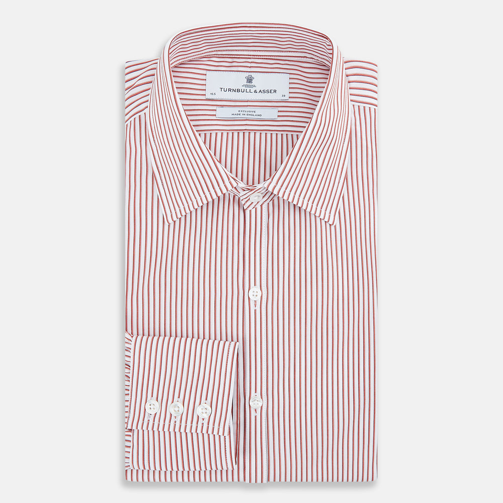 The Red Shadow Stripe Westminster Shirt by Turnbull & Asser features long sleeves, a Turnbull collar, thin red and white vertical stripes, white buttons, and showcases British craftsmanship against a plain white background.