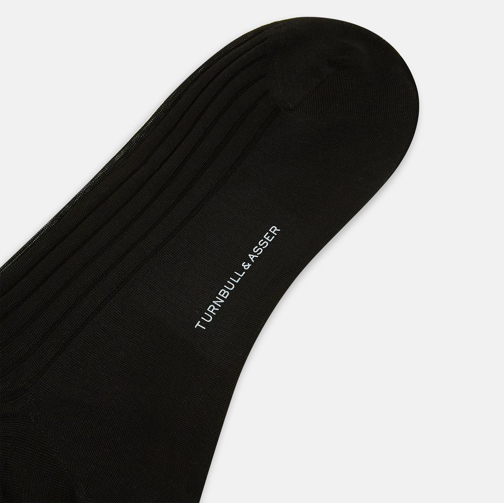 A single Dark Chocolate Mid-Length Sock by Turnbull & Asser is shown against a plain white background.