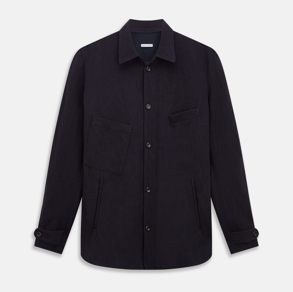 A navy button-up Primrose overshirt by Turnbull & Asser with a classic collar, two side pockets, a left chest pocket, and buttoned cuffs—an ideal blazer alternative, shown on a plain white background.