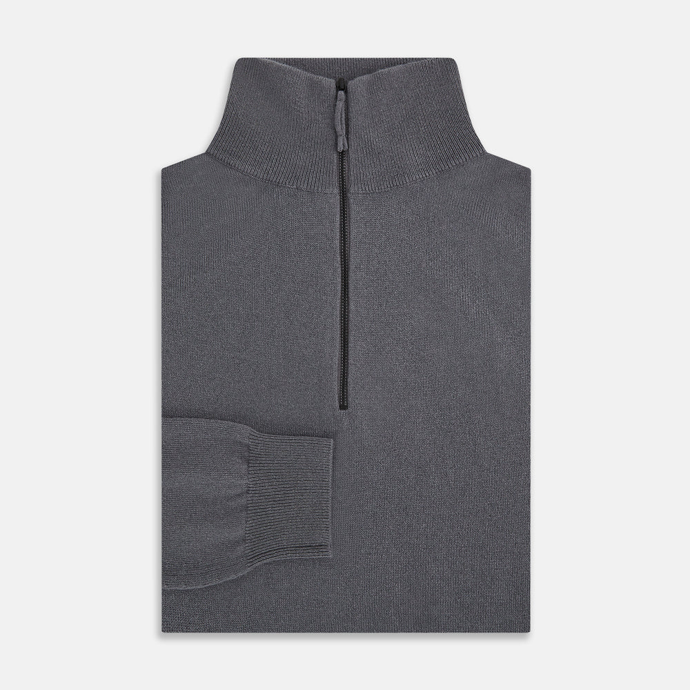 The Turnbull & Asser Grey Half-Zip Cashmere Jumper features long sleeves, a high collar, and premium yarn in dark gray. This classic knitwear is showcased against a white background.