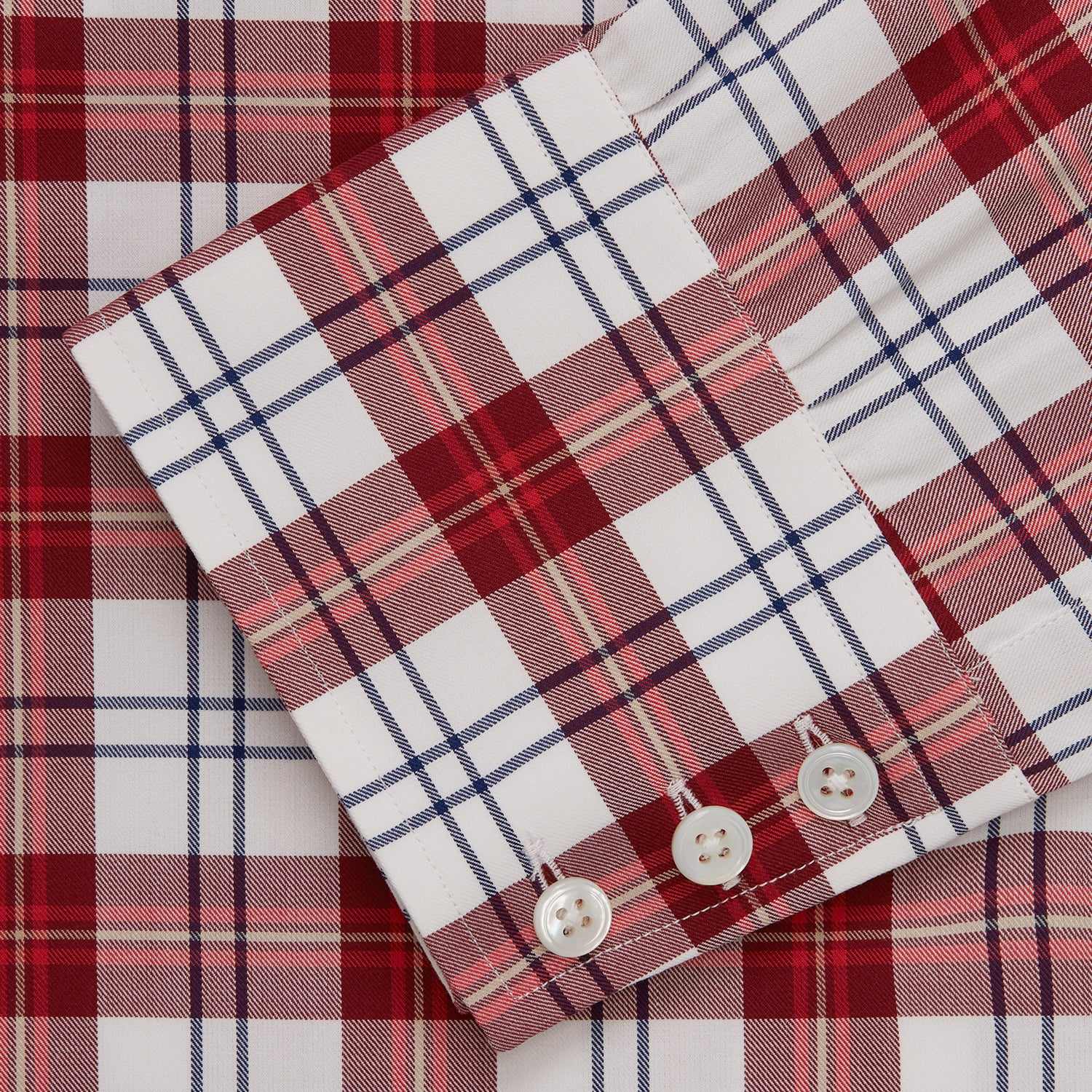 View 5 of product The Turnbull & Asser Red Check Shirt, featuring a T&A collar and 3-button cuffs, is displayed laid flat on a white background.
