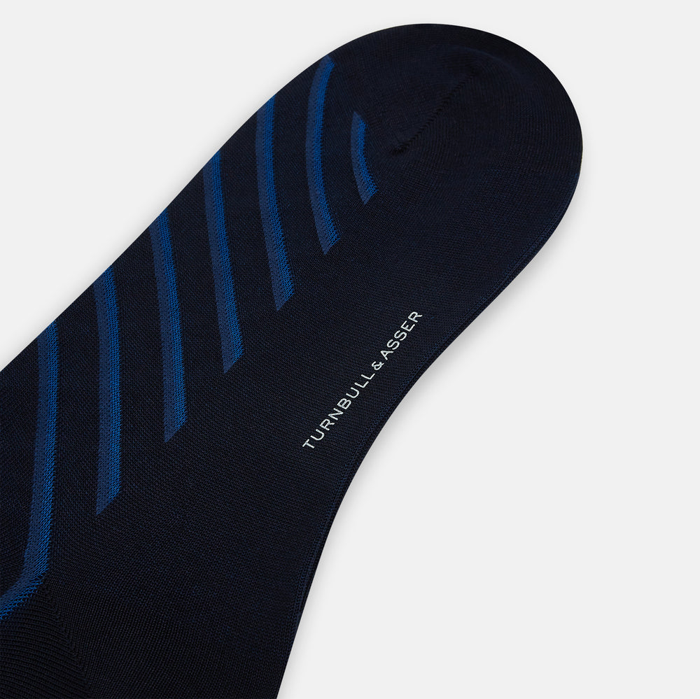 The Turnbull & Asser Navy Diagonal Striped Long Sock, crafted from premium mercerised Egyptian cotton, is shown solo on a plain white background.