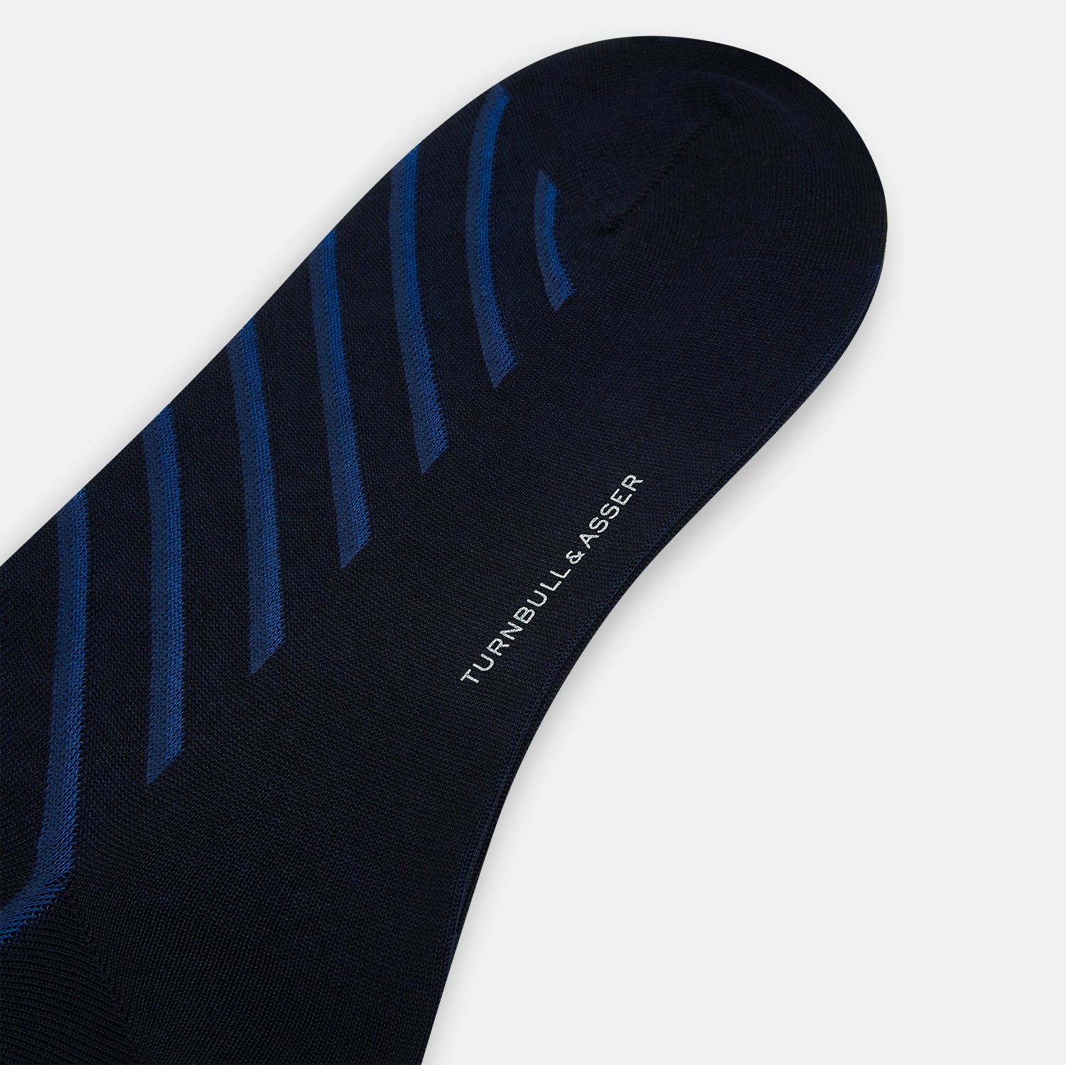 View 3 of product The Turnbull & Asser Navy Diagonal Striped Long Sock, crafted from premium mercerised Egyptian cotton, is shown solo on a plain white background.